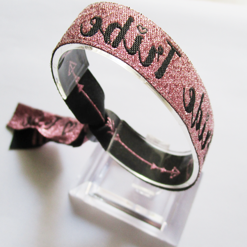 woven wristband with shiny pink metallic thread
