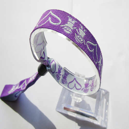 woven wristband with one time use plastic oval slid closure