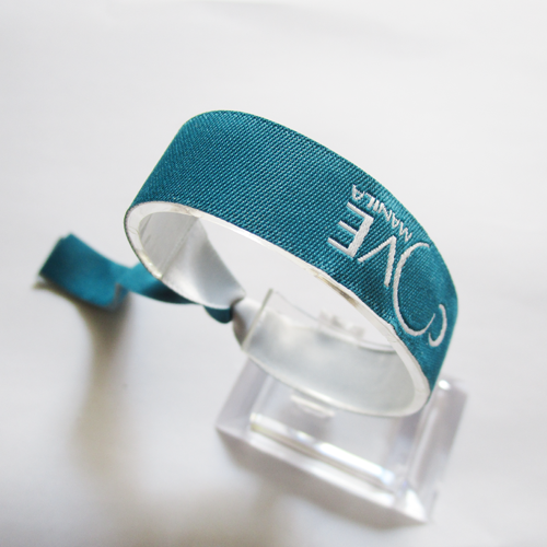woven wristband with reusable plastic bead