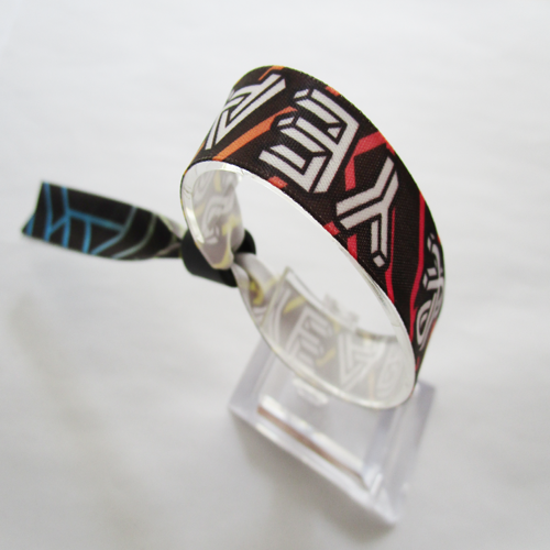 satin wristband with one time use plastic sild closure with metal teeth inside