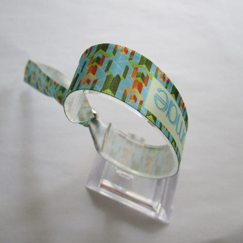 satin wristband with reusable use metal bead