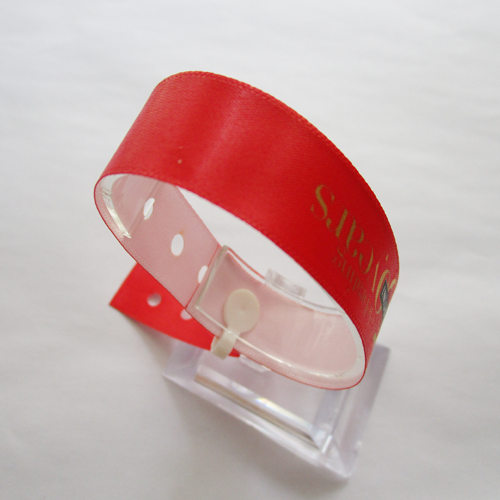satin wristband with one time use plastic clip 