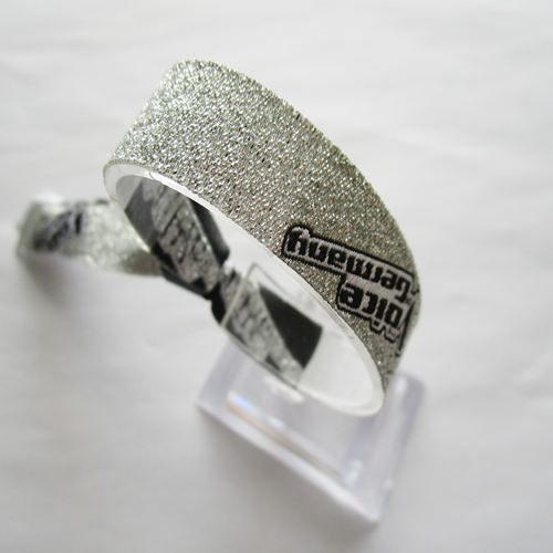 woven wristband with shiny silver metallic thread