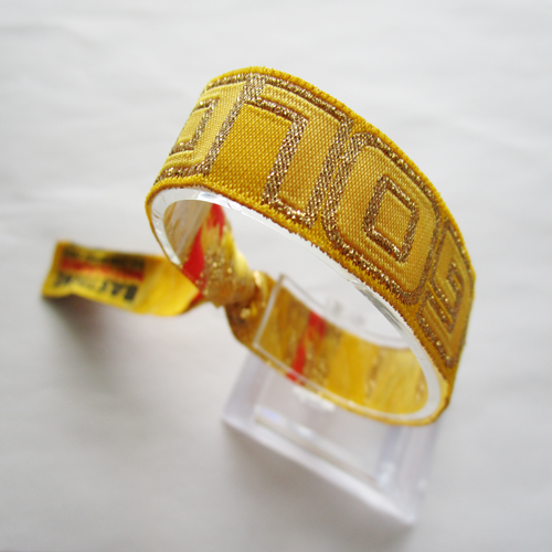 woven wristband with shiny gold metallic thread