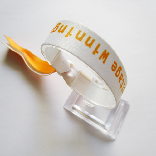 polyester wristband with one time use plastic round slid closure