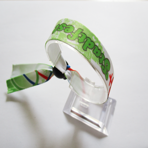 polyester wristband with reusable plastic spring accessory