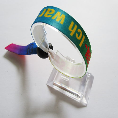 polyester wristband with reusable plastic spring accessory
