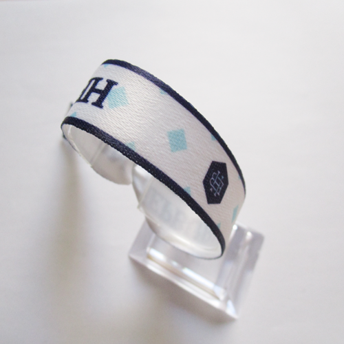 polyester wristband with reusable metal bead