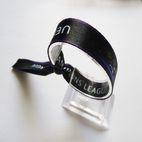 polyester wristband with reusable plastic bead