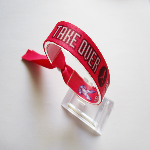 polyester wristband with reusable plastic bead