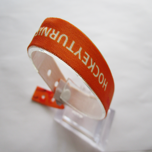 polyester wristband with one time use PVC button